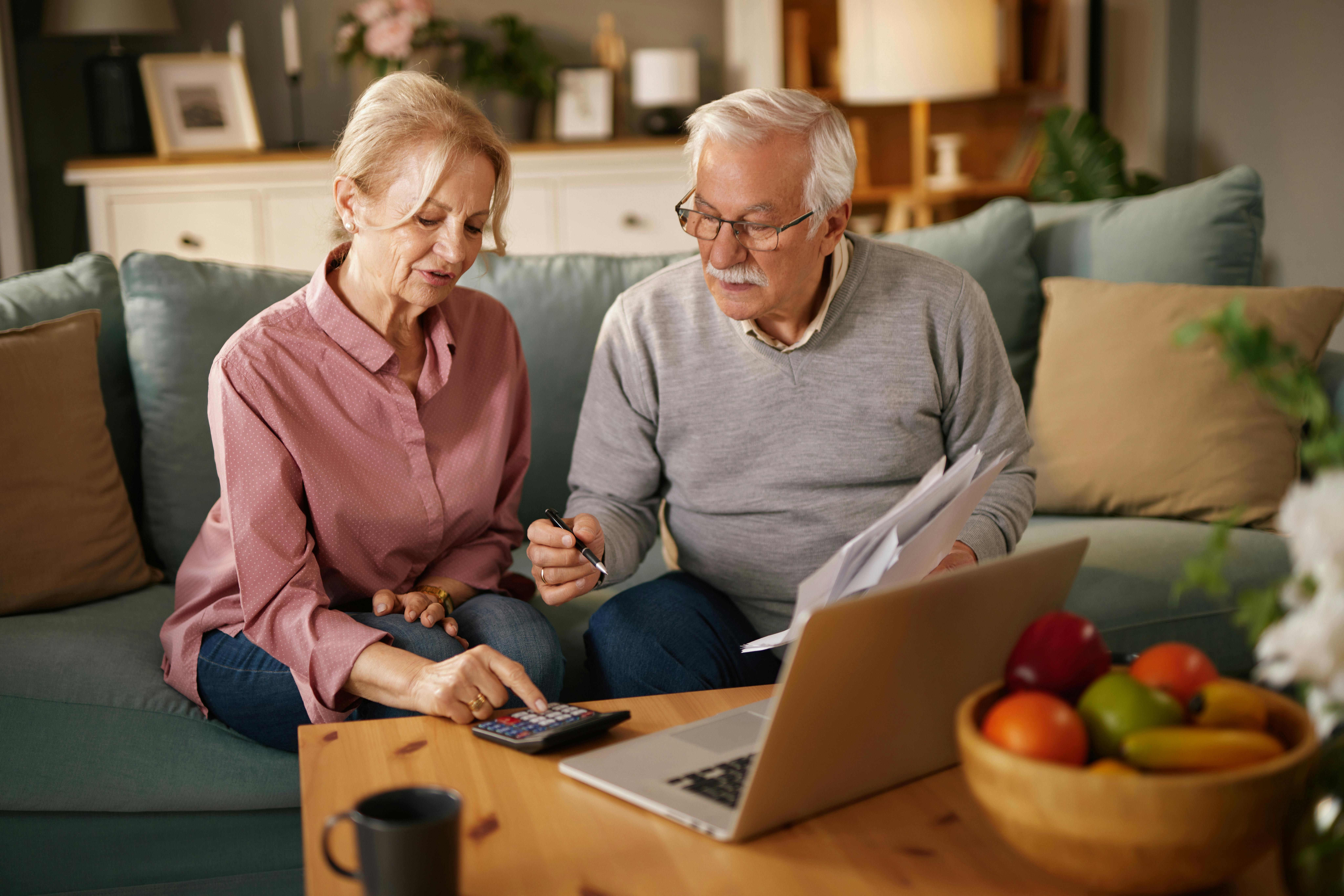 an older couple looking at a uk guide to pensions and inheritance tax changes